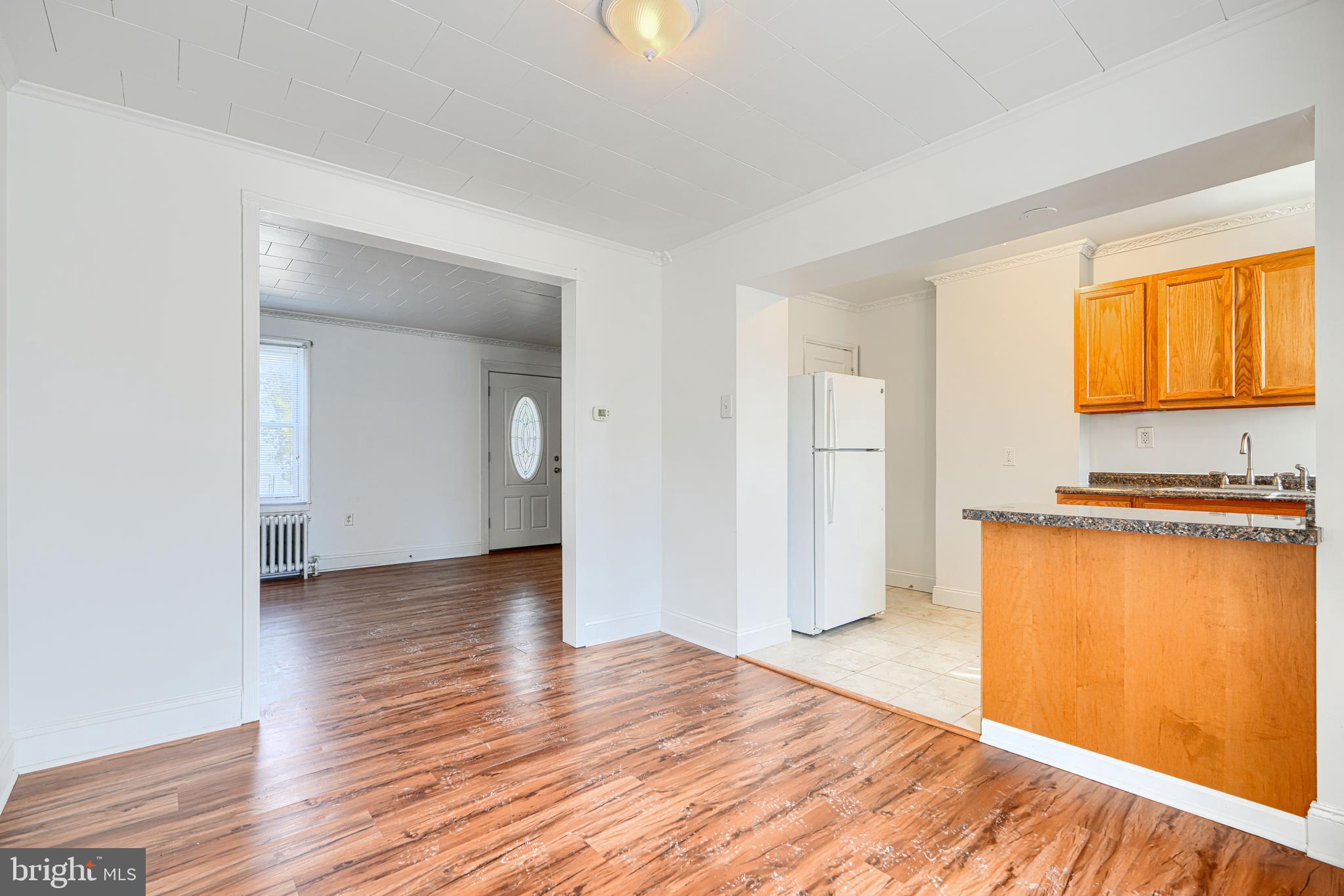 30 Portship Road Baltimore, MD 21222 - Photo 7 of 33 a view of a kitchen with wooden floor and a sink