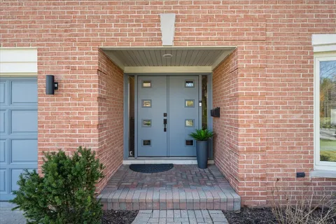 a front view of a house with an outdoor space