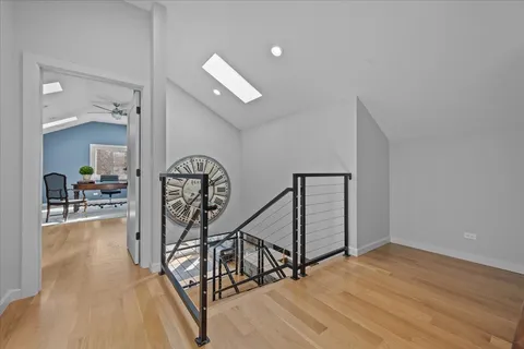 a view of a livingroom with furniture and stairs