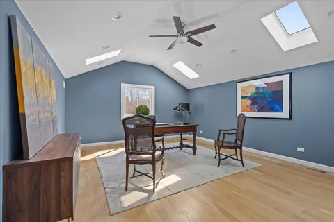 a view of a livingroom with furniture and a window