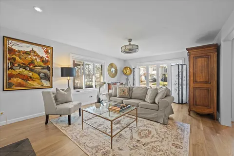 a living room with furniture and a table