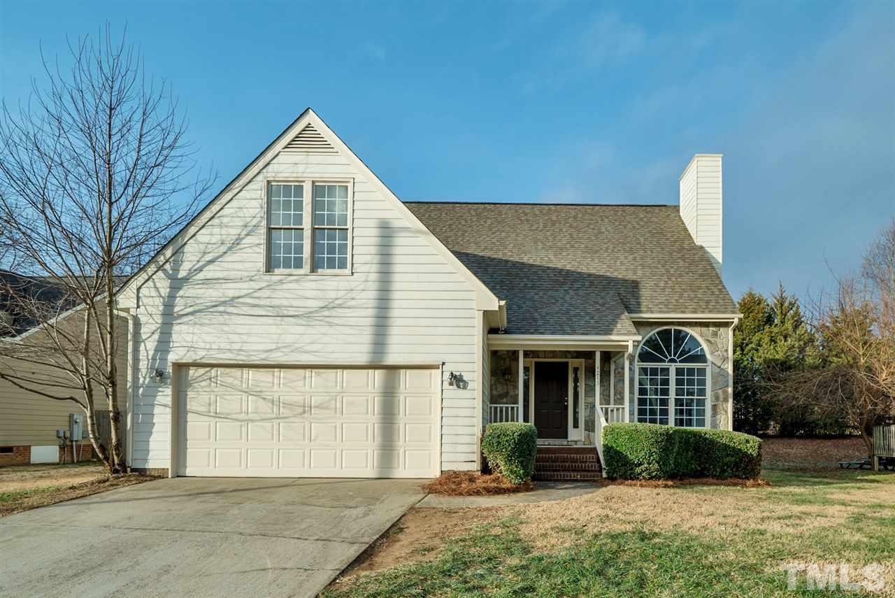 4213 Knightsbridge Way Raleigh, NC 27604 - Photo 1 of 23 a front view of a house with garden