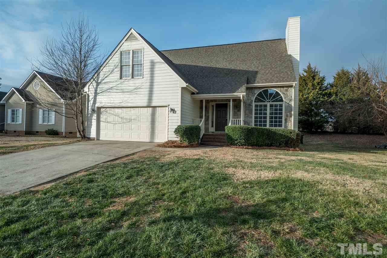 4213 Knightsbridge Way Raleigh, NC 27604 - Photo 2 of 23 a view of a house with backyard and garden