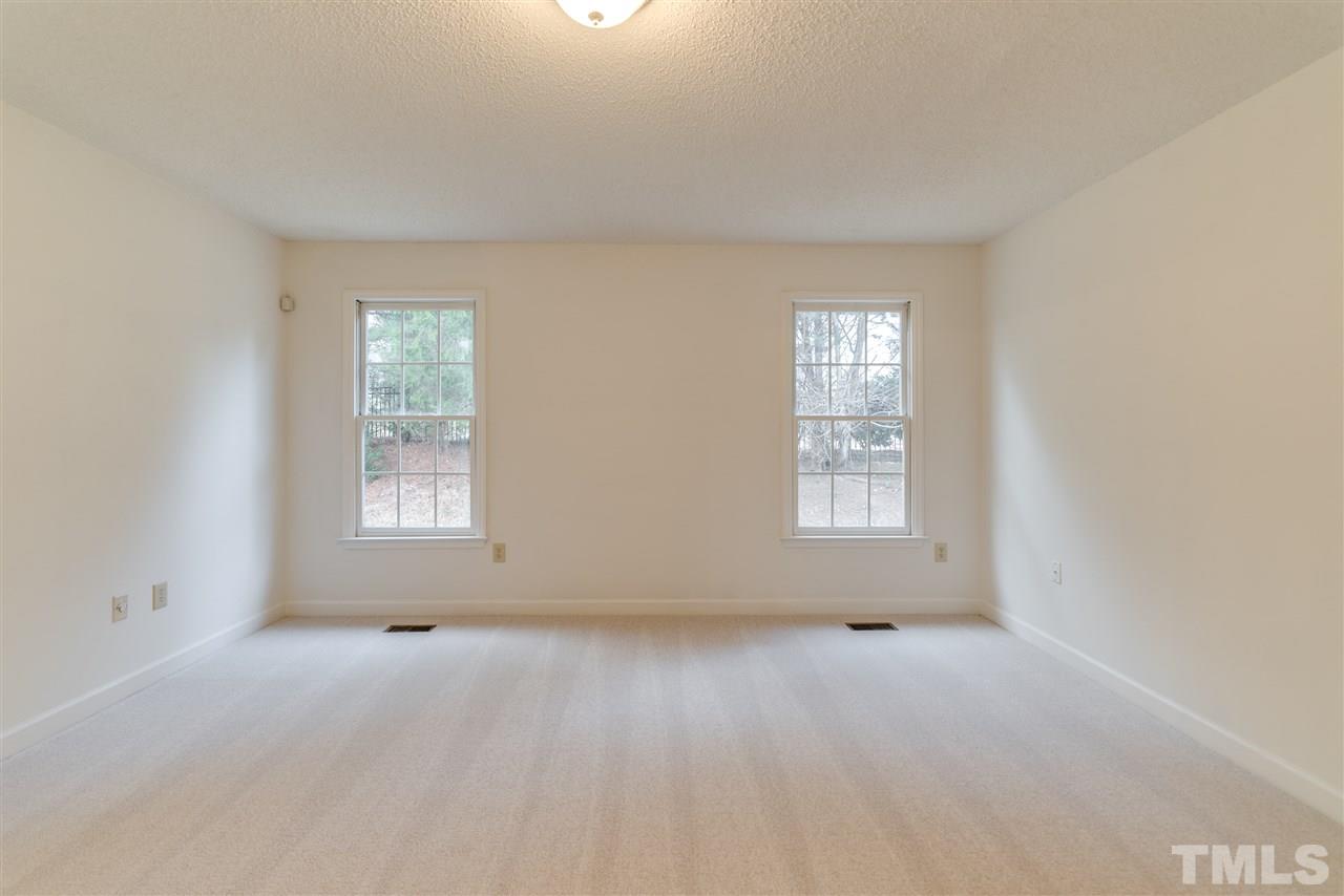 4213 Knightsbridge Way Raleigh, NC 27604 - Photo 14 of 23 an empty room with a window