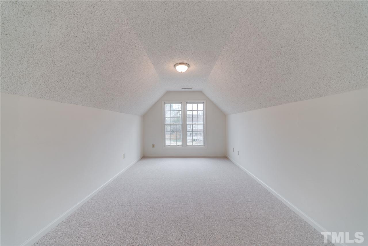 4213 Knightsbridge Way Raleigh, NC 27604 - Photo 20 of 23 wooden floor in an empty room with a window