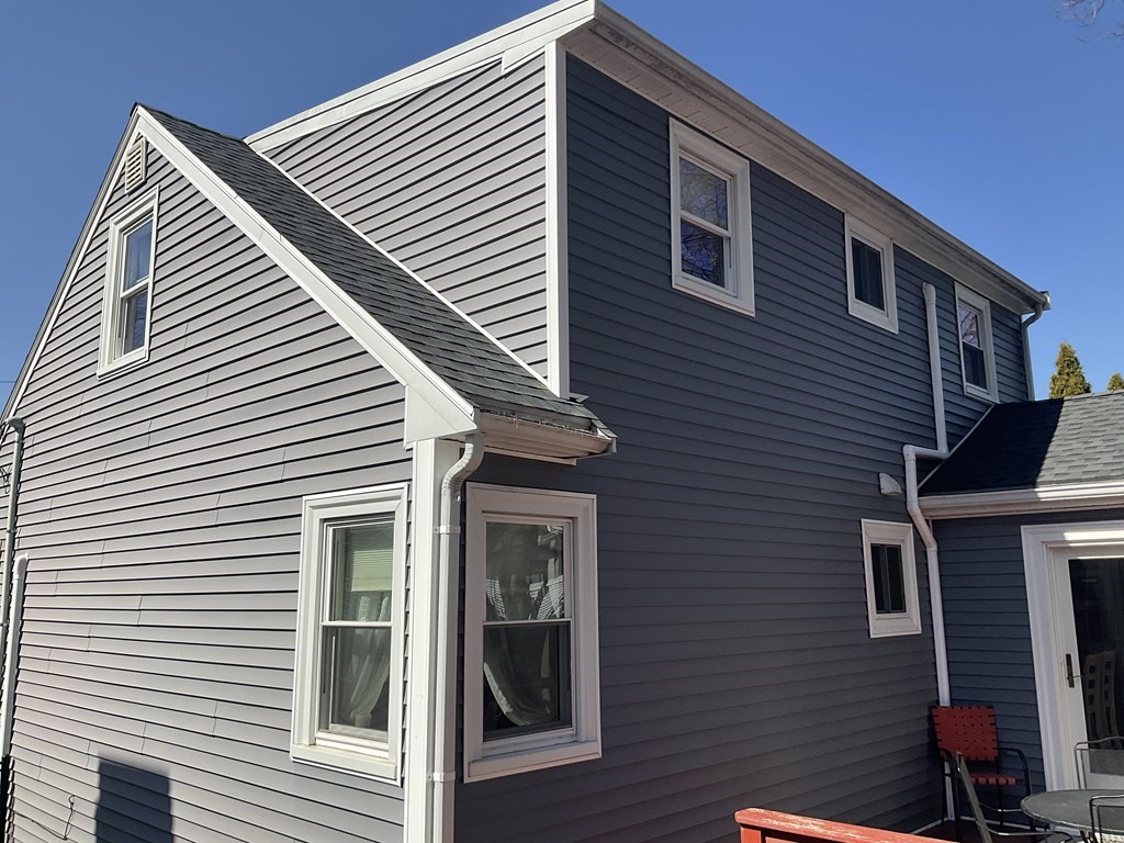 18 Ridgeway Street Dedham, MA 02026 - Photo 3 of 24 a view of a house with a yard