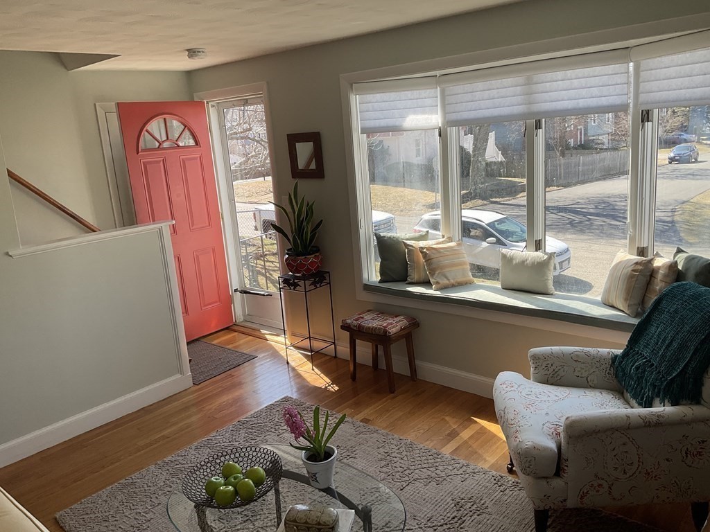 18 Ridgeway Street Dedham, MA 02026 - Photo 5 of 24 a living room with furniture and a window