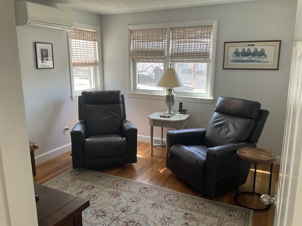 18 Ridgeway Street Dedham, MA 02026 - Photo 10 of 24 a living room with furniture and a window