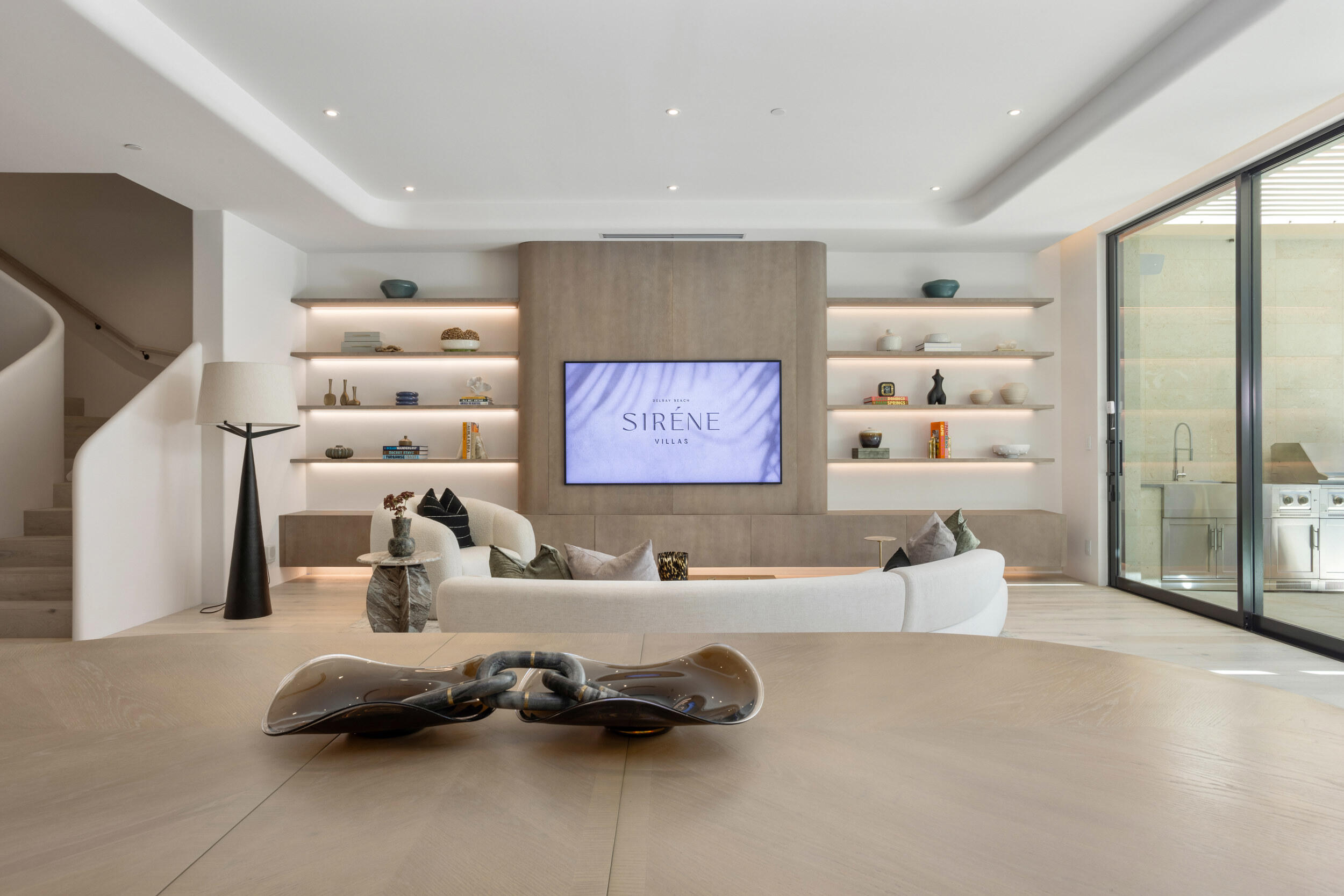 1246 George Bush Boulevard Delray Beach, FL 33483 - Photo 10 of 63 a room with gym equipment and a large window