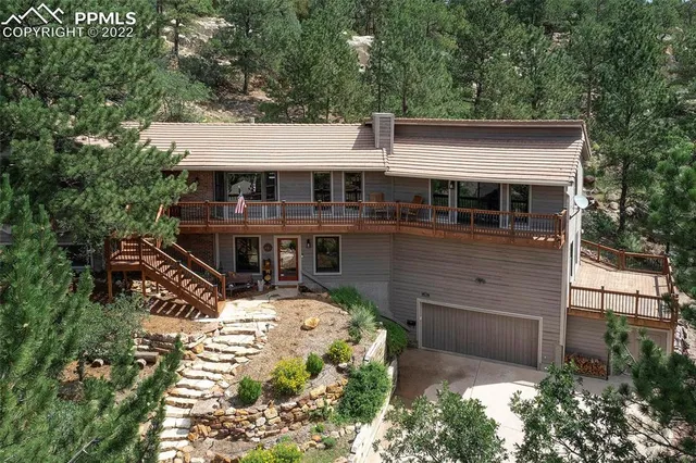 a view of a house with roof deck