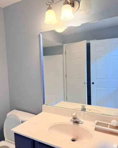 8116 North Ridge Loop West, Unit 8 Eagle Mountain, UT 84005 - Photo 12 of 23 Bathroom featuring vanity and toilet