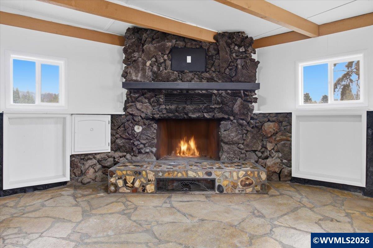 28411 Liberty Road Sweet Home, OR 97386 - Photo 25 of 50 a living room with furniture and a fireplace