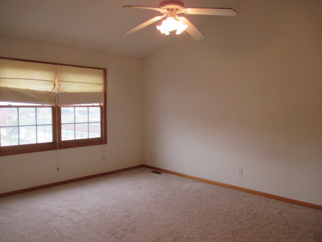 802 Ridge Drive Elburn, IL 60119 - Photo 7 of 14 an empty room with a window