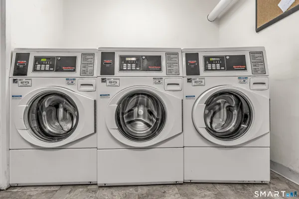 a view of entryway with washer and dryer