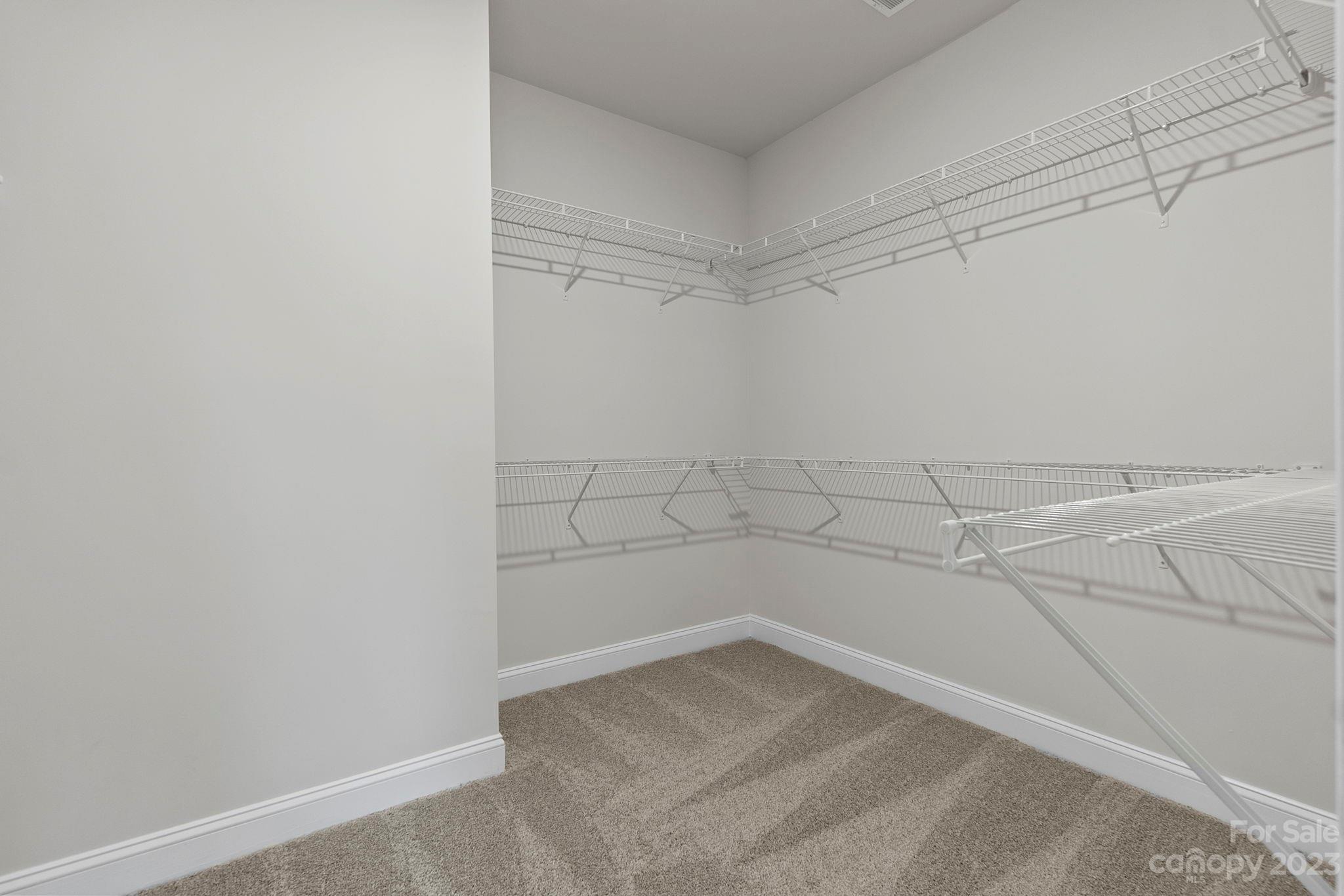 4513 Forsyth Place Fort Mill, SC 29708 - Photo 15 of 24 a view of a room with racks on the wall