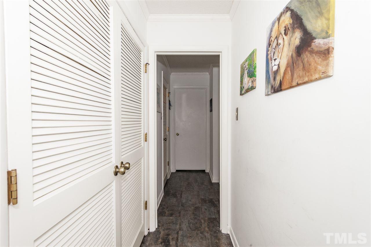 43 Stoneridge Road Durham, NC 27705 - Photo 12 of 24 a view of a hallway with wooden floor