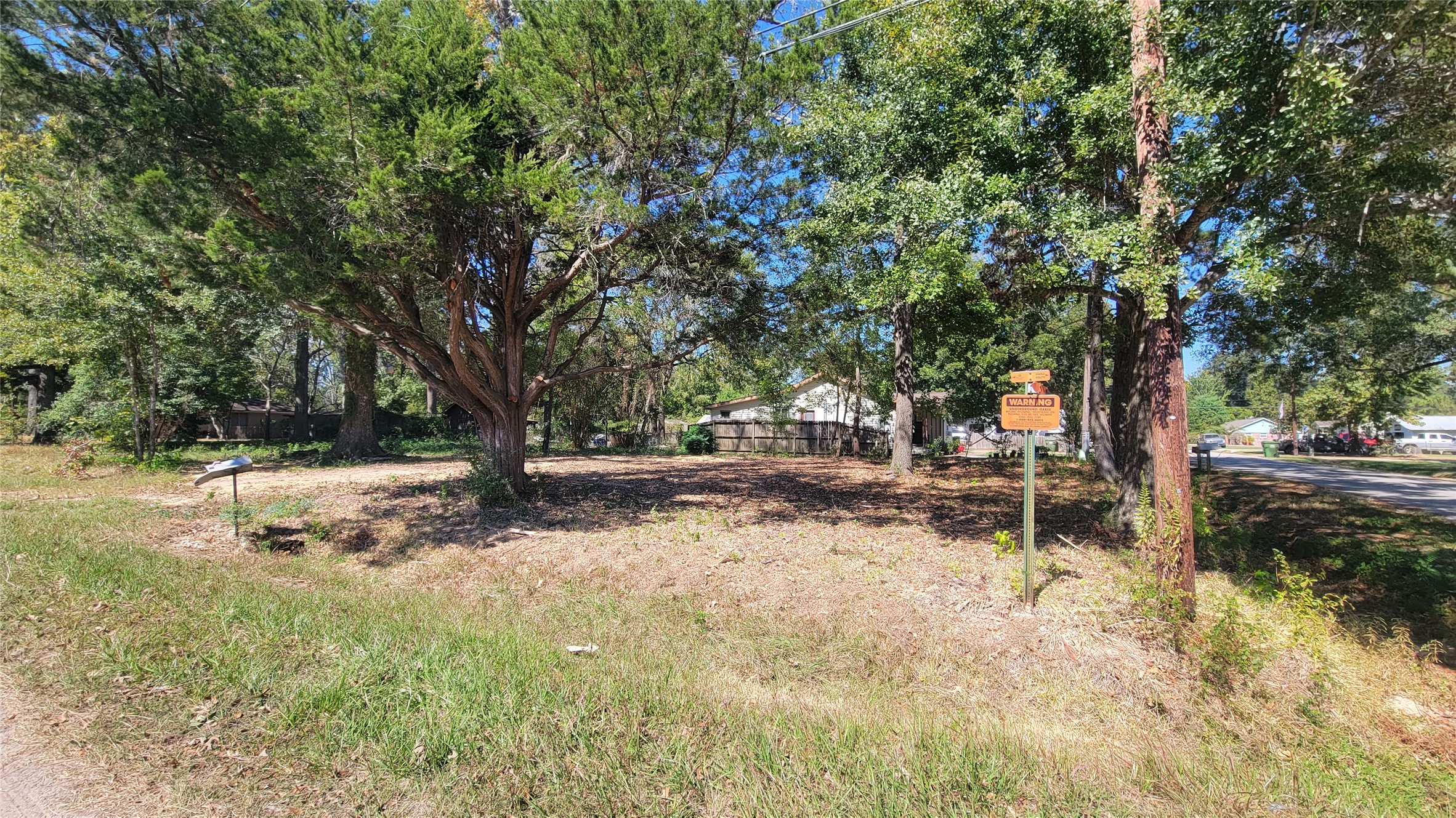 1109 Truman Street Cleveland, TX 77327 - Photo 1 of 4 a backyard of a house with table and chairs