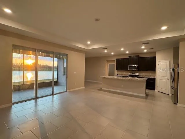 a kitchen with granite countertop sink and granite top