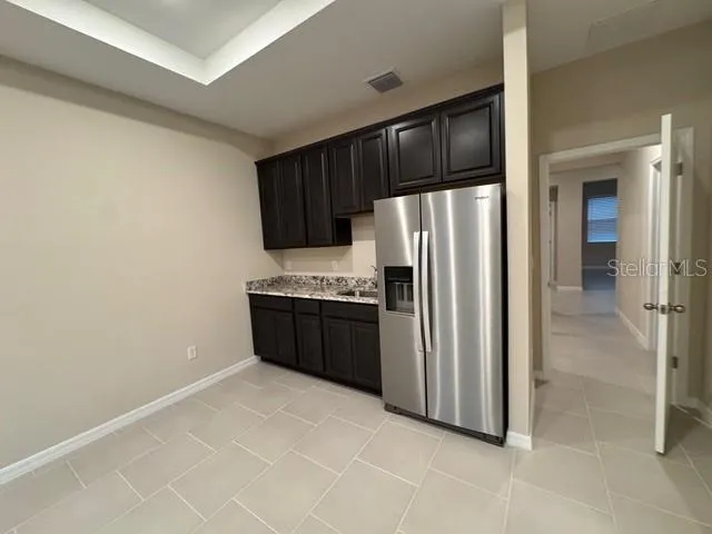 an empty room with sliding door