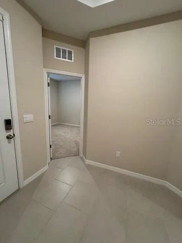 an empty room with windows