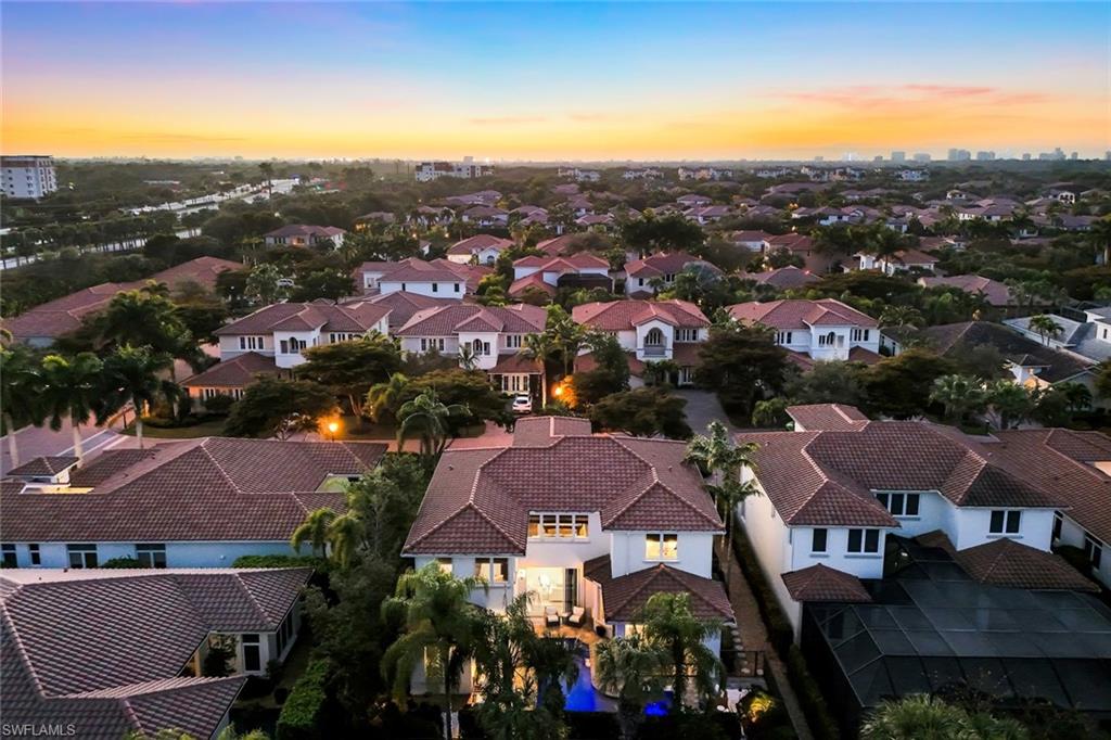 2106 Modena Court Naples, FL 34105 - Photo 41 of 42 a view of a city with mountains