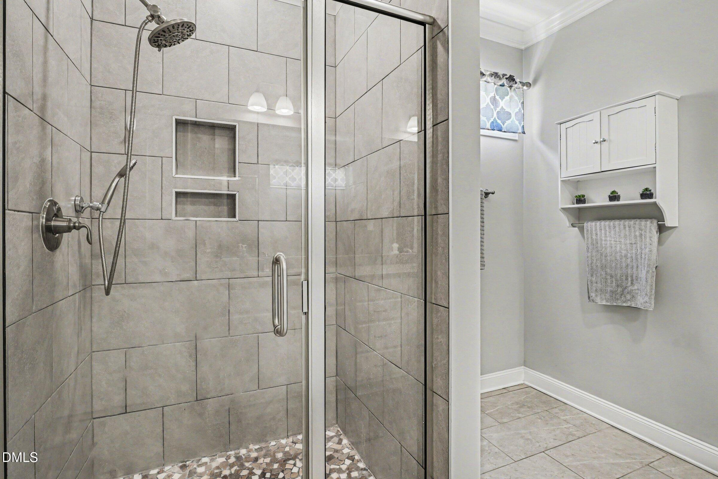 130 Aylebury Ridge Zebulon, NC 27597 - Photo 22 of 41 a bathroom with a shower and a sink
