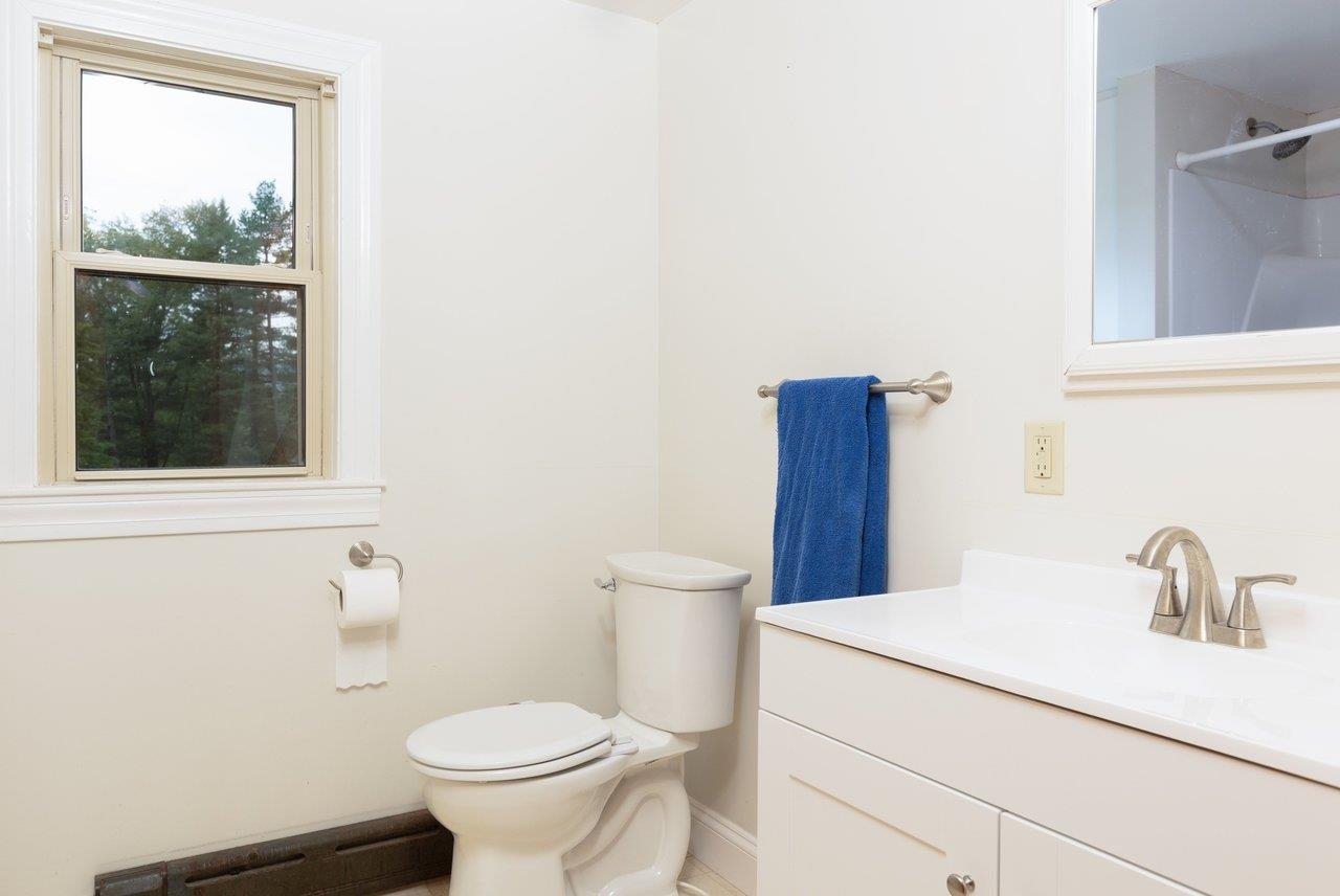 547 Grindstone Road Bridgewater, VA 22812 - Photo 23 of 57 a bathroom with a toilet sink and mirror