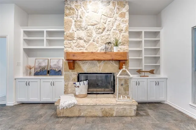 a living room with a fireplace