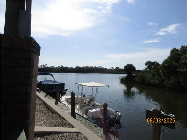 a view of a lake with houses