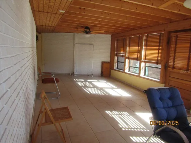 a view of a balcony with chair