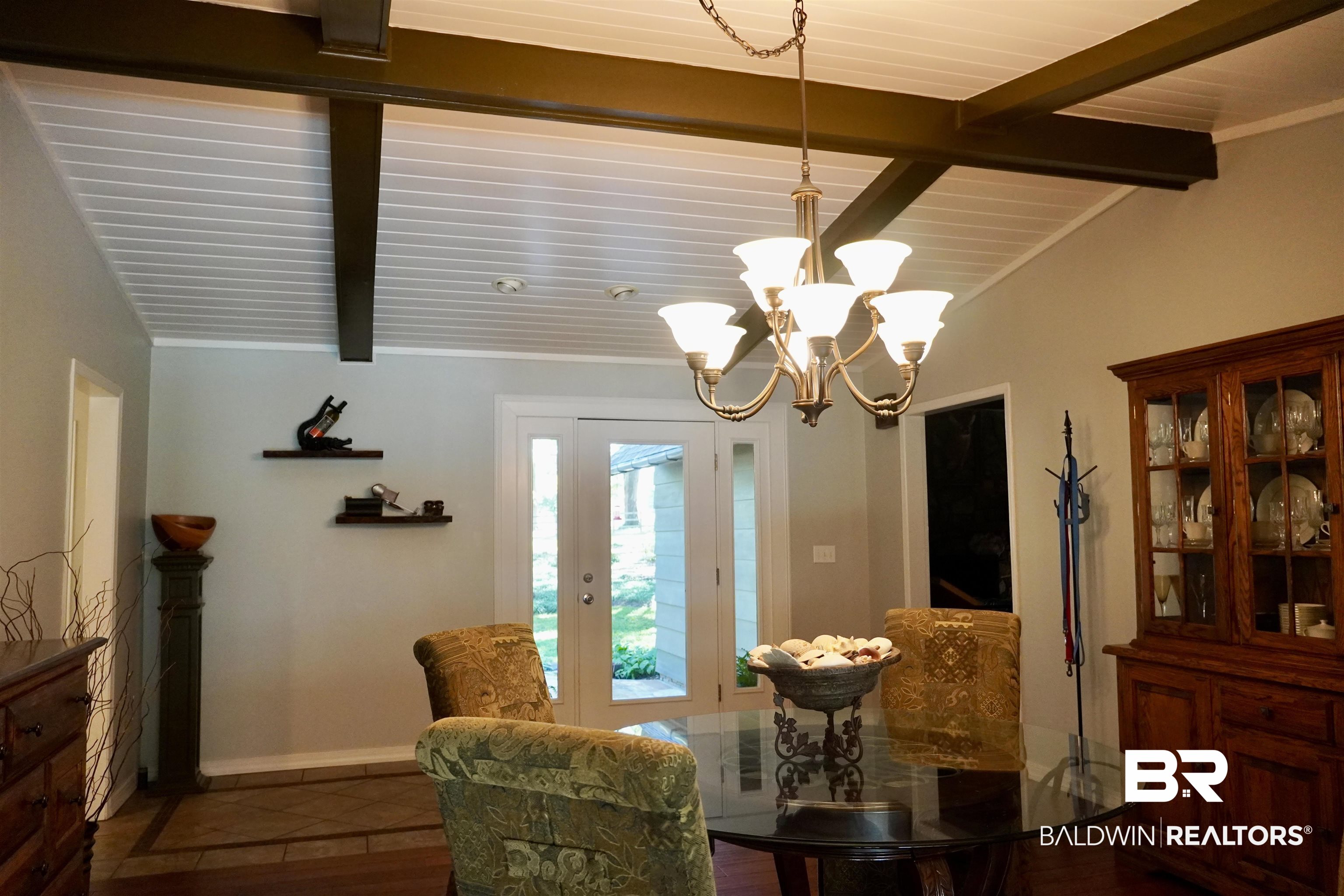 117 Belle Meade Brewton, AL 36426 - Photo 14 of 62 Dining room featuring a chandelier, wood-type flooring, wood ceiling, and lofted ceiling with beams