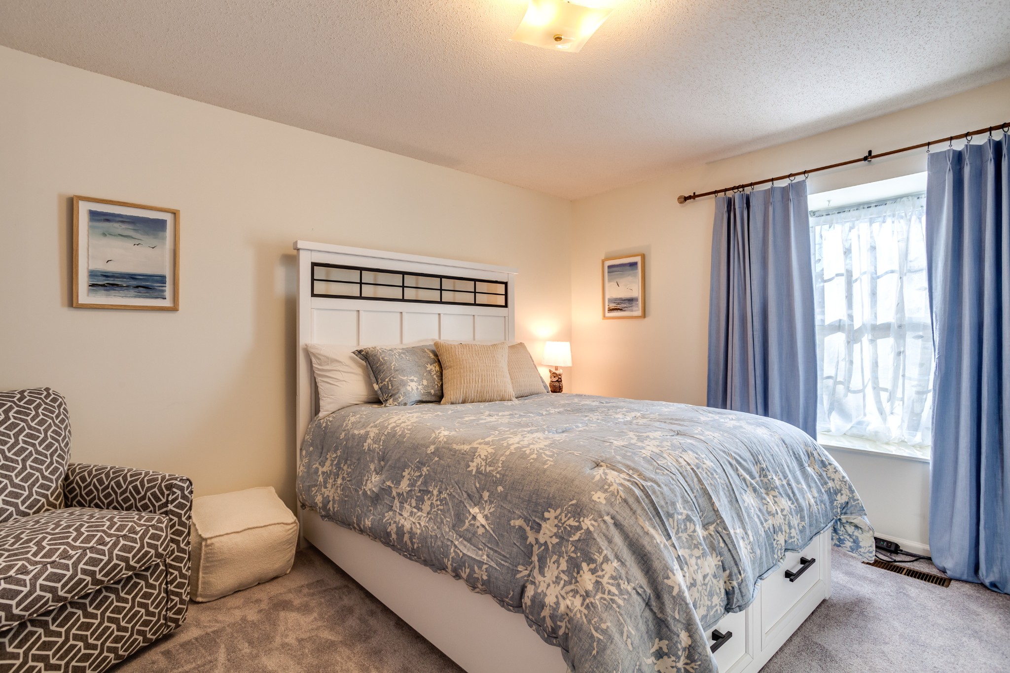 1434 Pine Springs Road Knoxville, TN 37922 - Photo 17 of 53 a large bed sitting in a bedroom next to a window