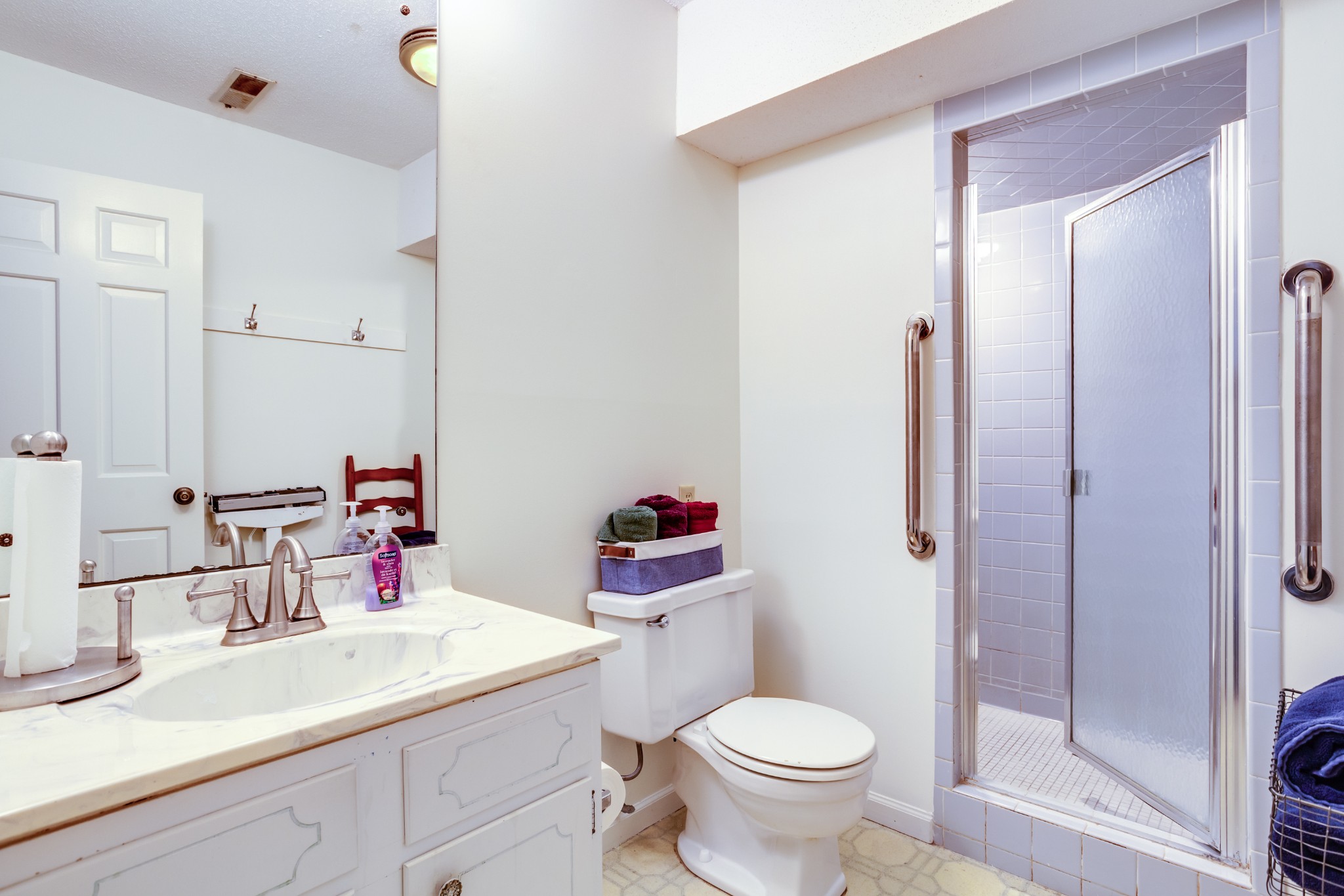 1434 Pine Springs Road Knoxville, TN 37922 - Photo 24 of 53 a bathroom with a sink toilet vanity and shower