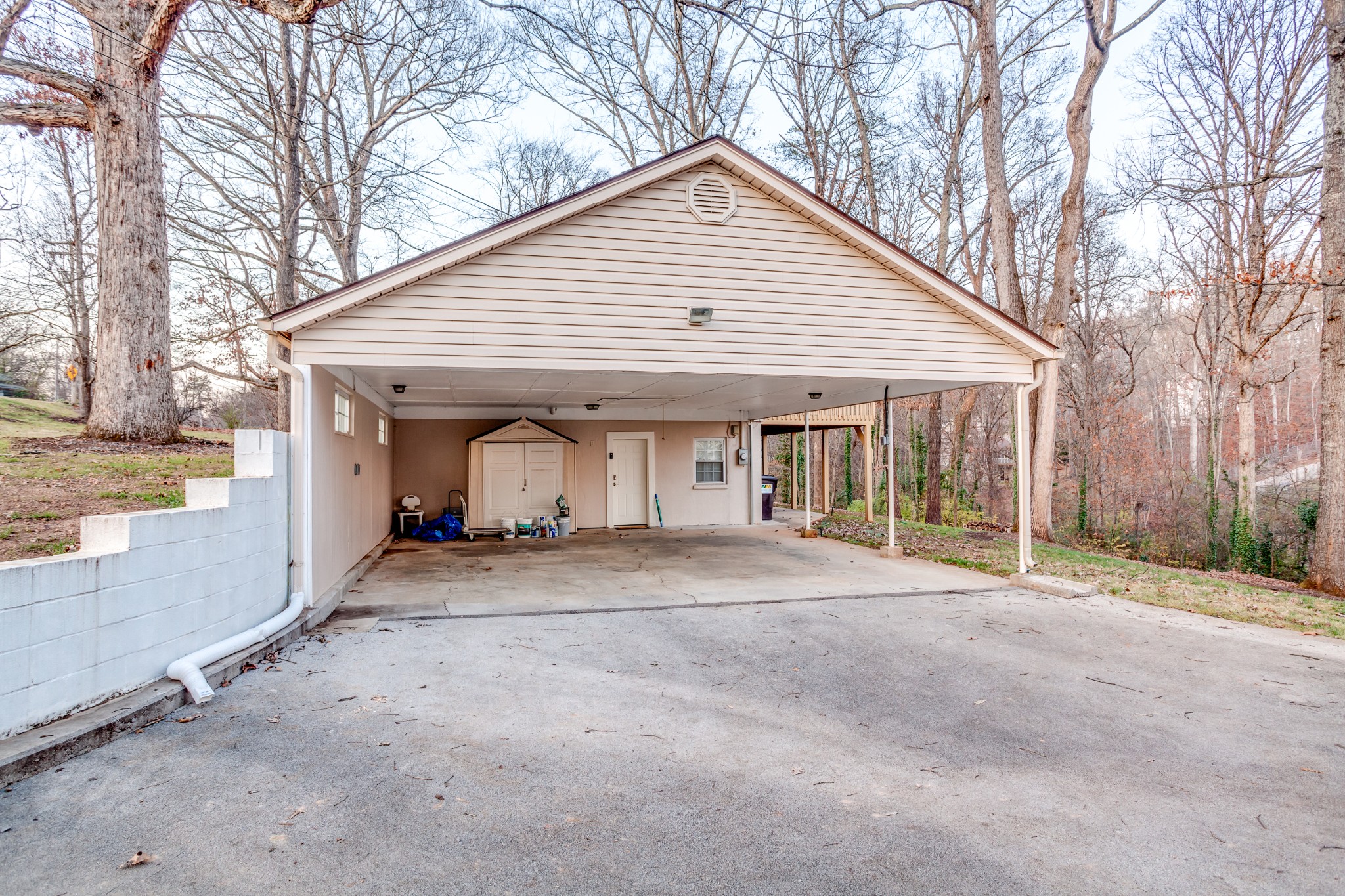 1434 Pine Springs Road Knoxville, TN 37922 - Photo 29 of 53 a view of a house with a yard and garage