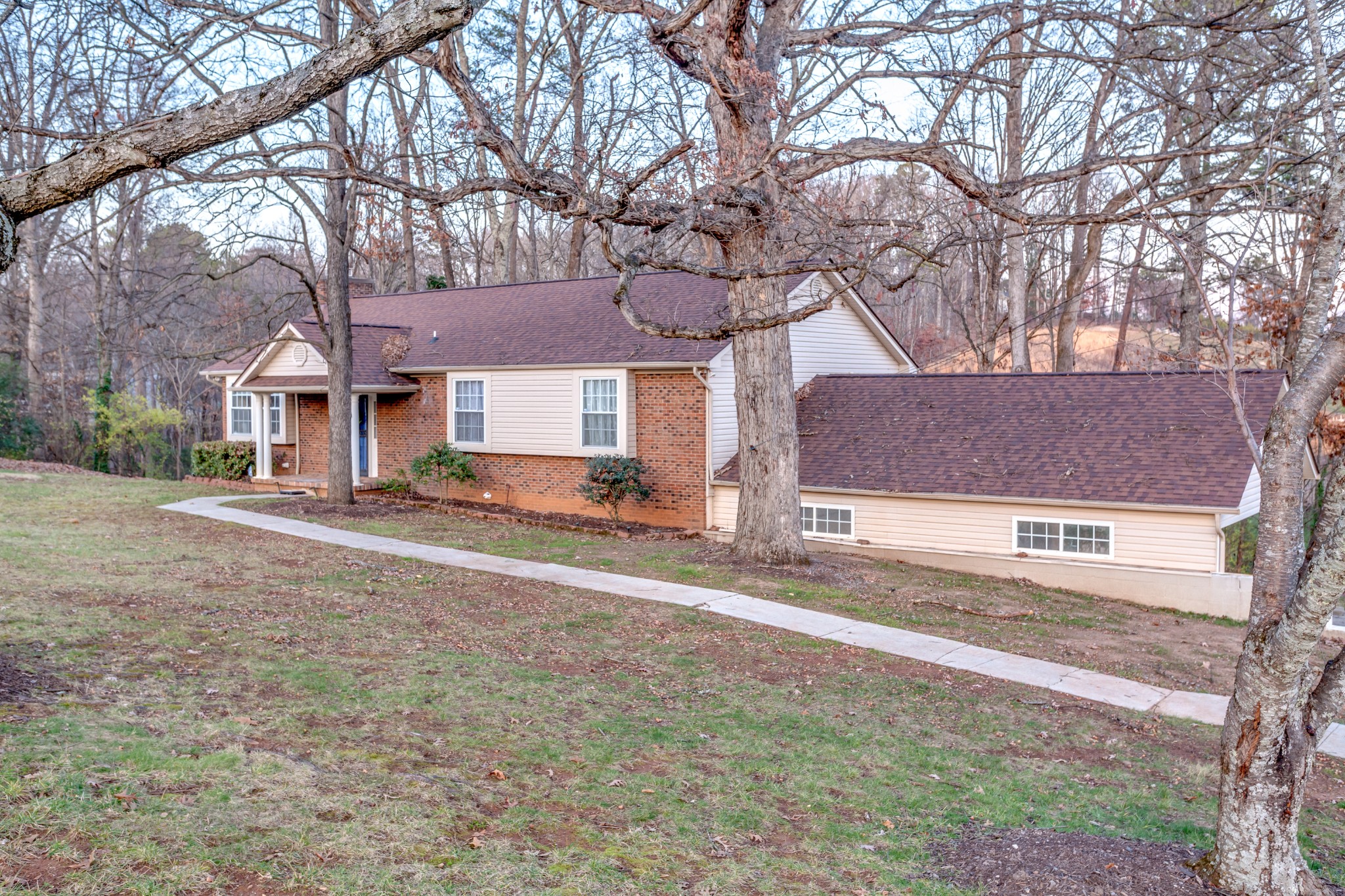1434 Pine Springs Road Knoxville, TN 37922 - Photo 32 of 53 a view of a yard with a large tree