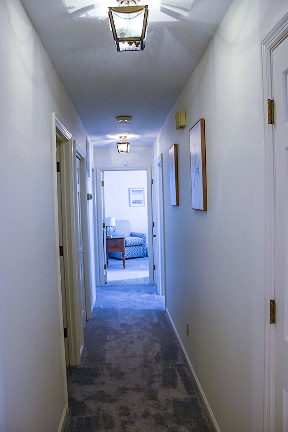 1434 Pine Springs Road Knoxville, TN 37922 - Photo 36 of 53 a view of a hallway and a livingroom with furniture