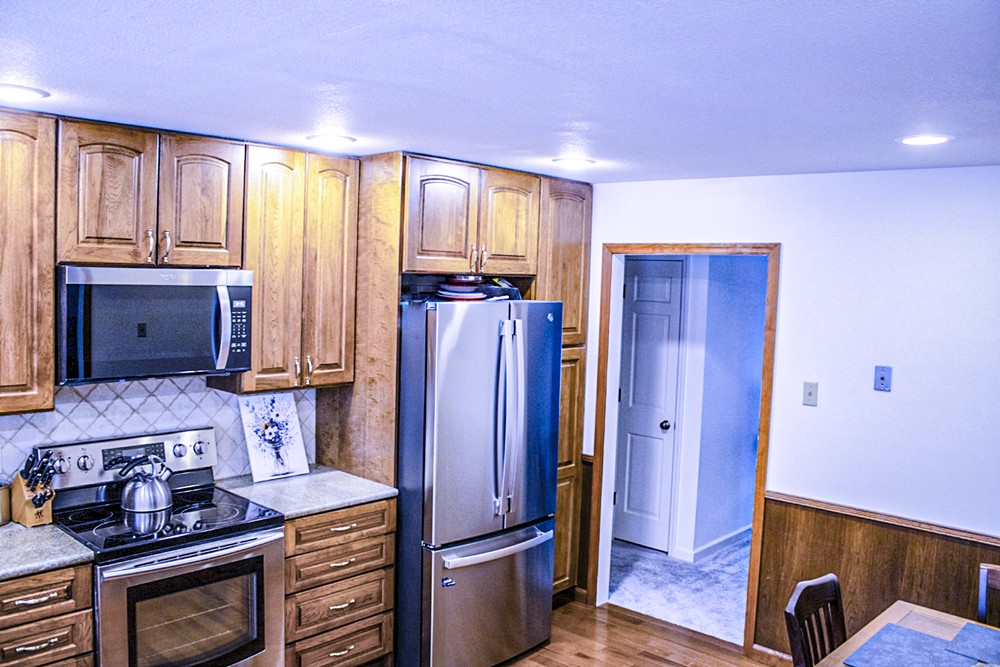 1434 Pine Springs Road Knoxville, TN 37922 - Photo 42 of 53 a kitchen with stainless steel appliances granite countertop a refrigerator and a stove top oven
