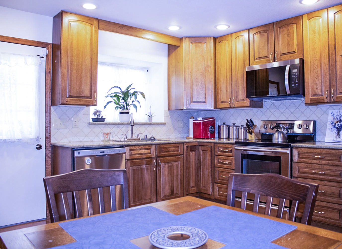 1434 Pine Springs Road Knoxville, TN 37922 - Photo 43 of 53 a kitchen with stainless steel appliances granite countertop a refrigerator a stove top oven a sink and dishwasher