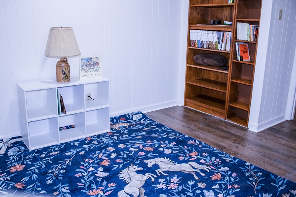 1434 Pine Springs Road Knoxville, TN 37922 - Photo 45 of 53 a living room with a book shelf