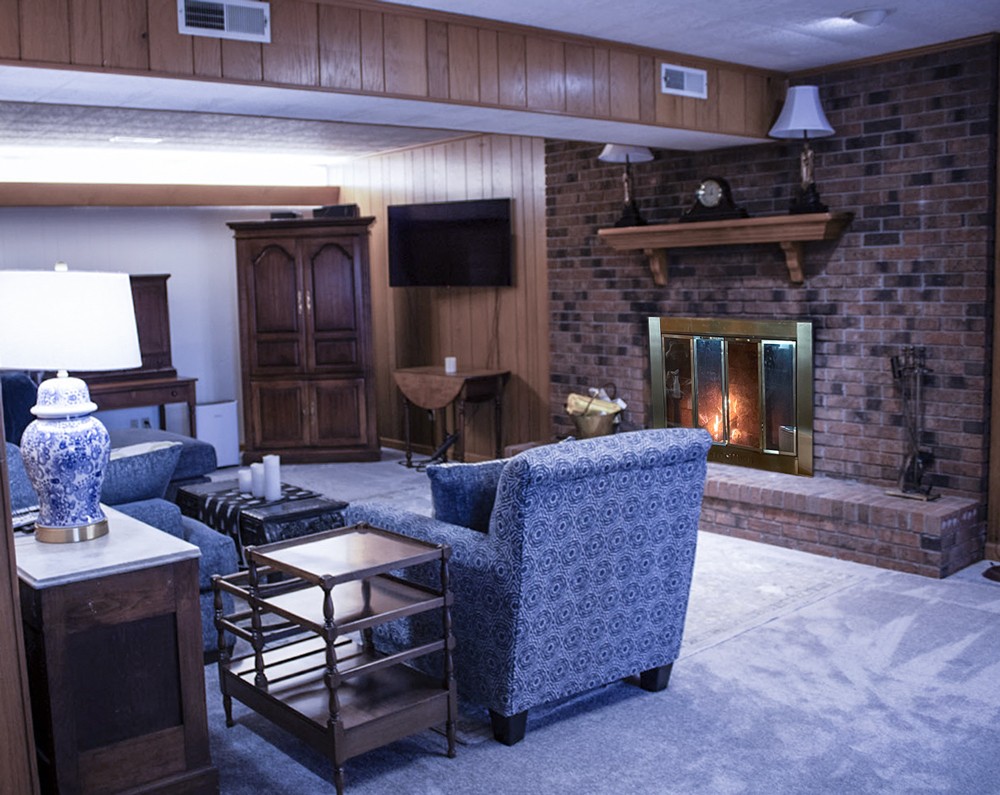 1434 Pine Springs Road Knoxville, TN 37922 - Photo 48 of 53 a living room with furniture and a fireplace
