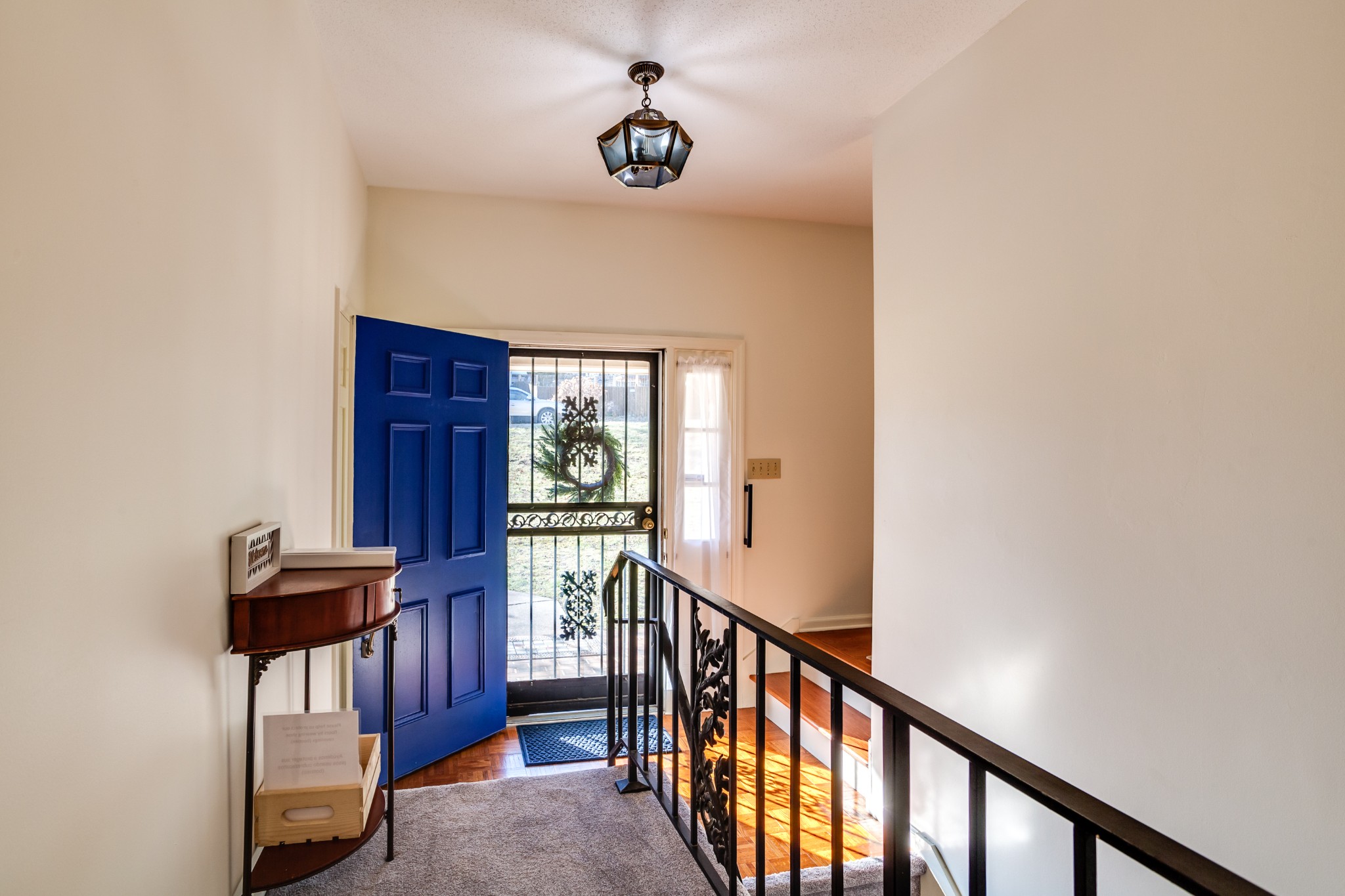 1434 Pine Springs Road Knoxville, TN 37922 - Photo 6 of 53 a view of a hallway with windows and furniture