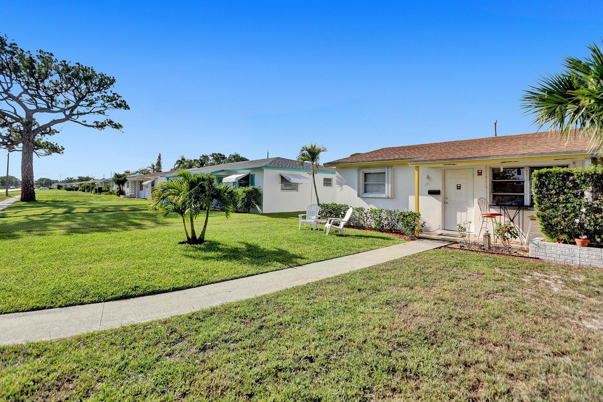 591 Silver Beach Road Riviera Beach, FL 33403 - Photo 2 of 29 G87A4066