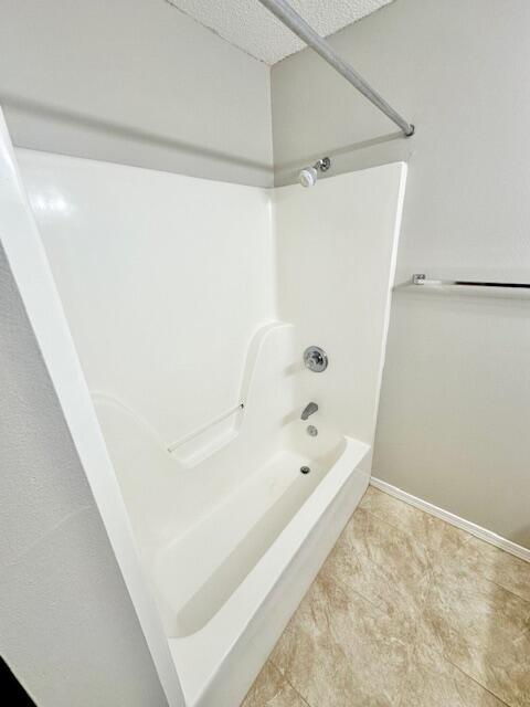 967 Tray Drive Fort Walton Beach, FL 32547 - Photo 20 of 26 a bathroom with a bathtub and a shower