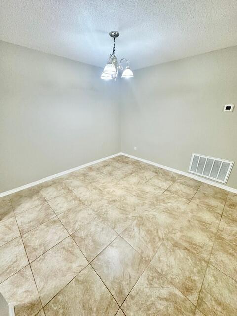 967 Tray Drive Fort Walton Beach, FL 32547 - Photo 7 of 26 a view of a room with a hanging light
