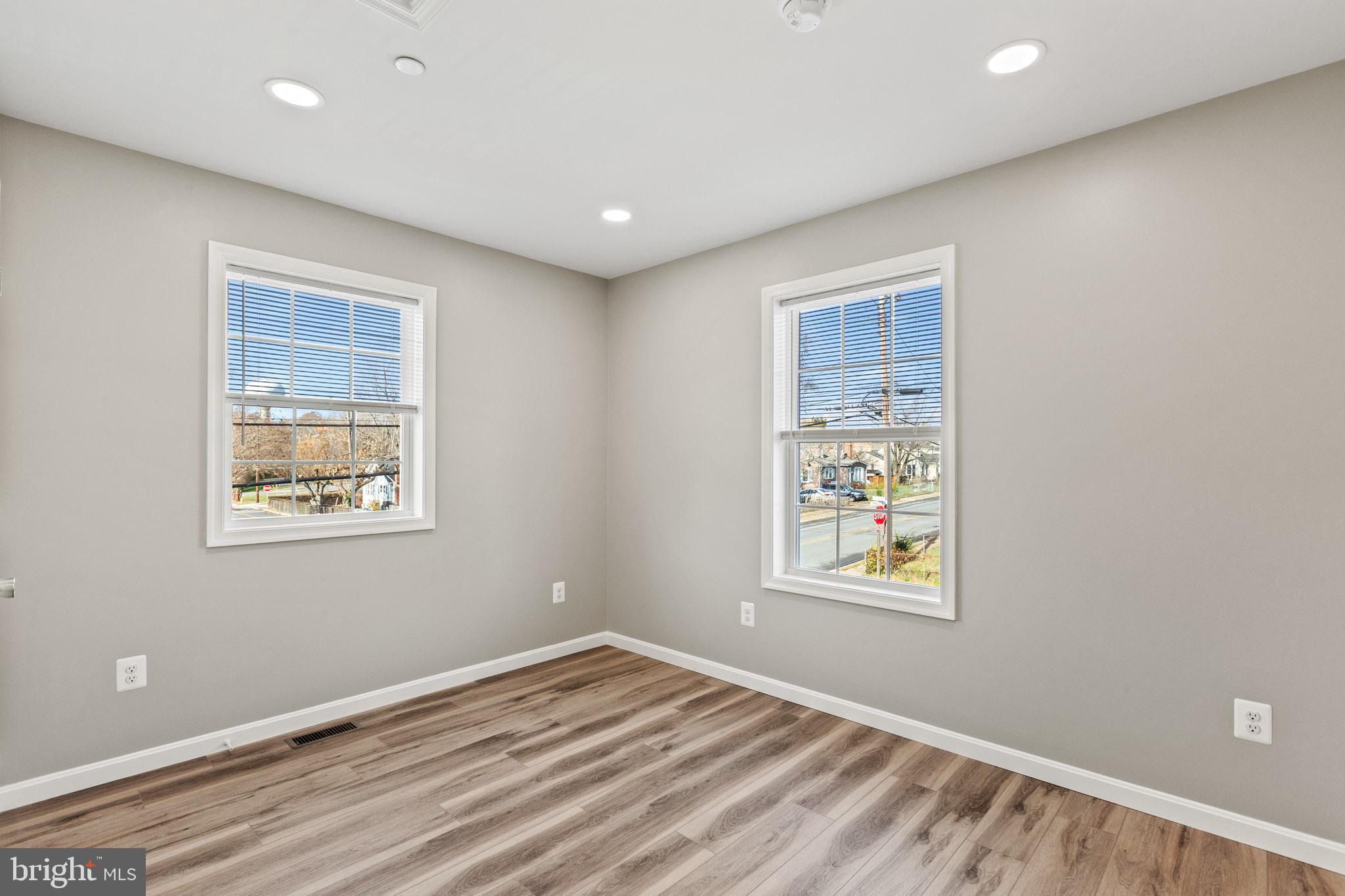 41573 Church Street Leonardtown, MD 20650 - Photo 18 of 27 a view of room with window and wooden floor
