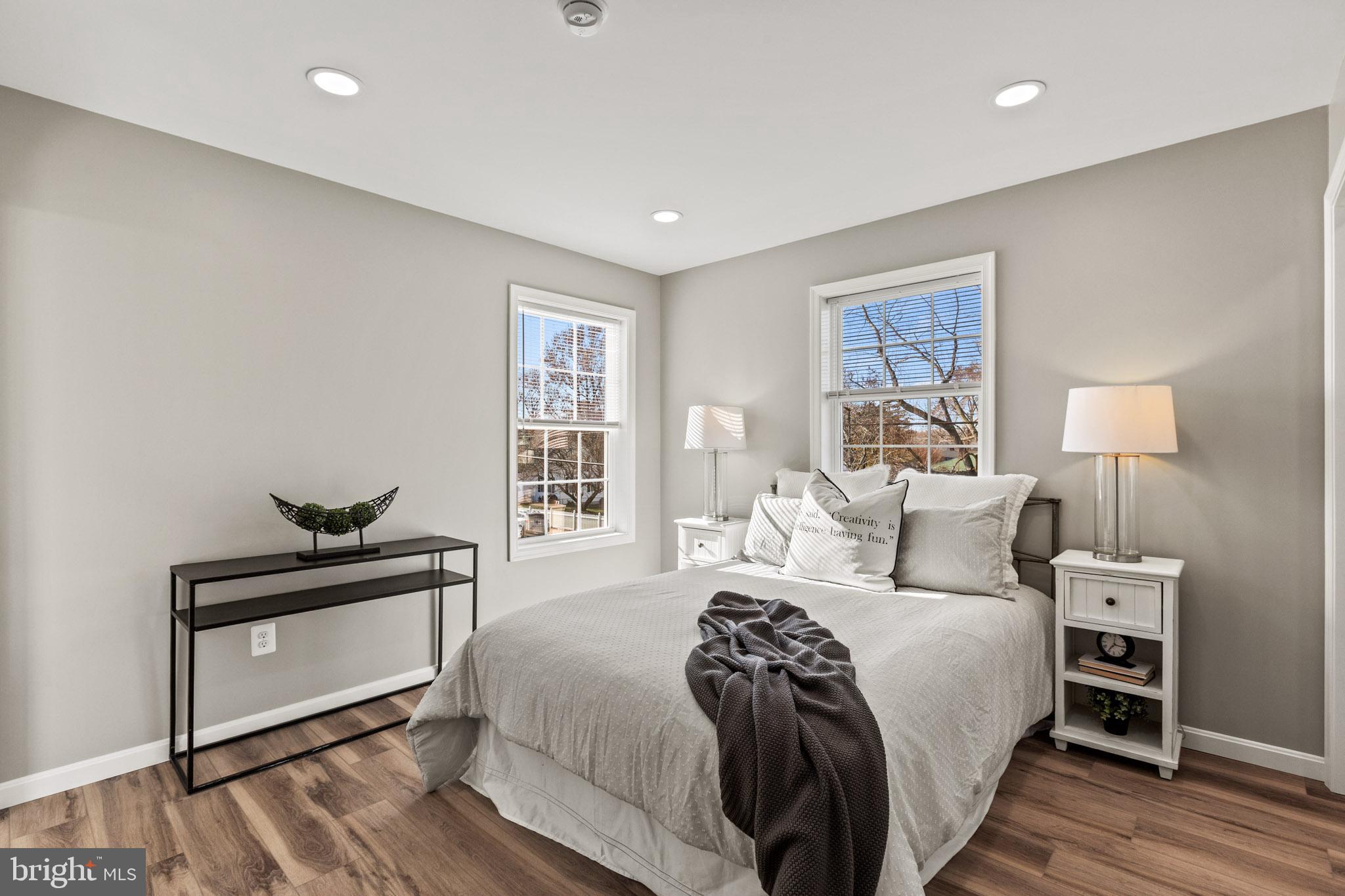 41573 Church Street Leonardtown, MD 20650 - Photo 23 of 27 a bedroom with a bed and a window