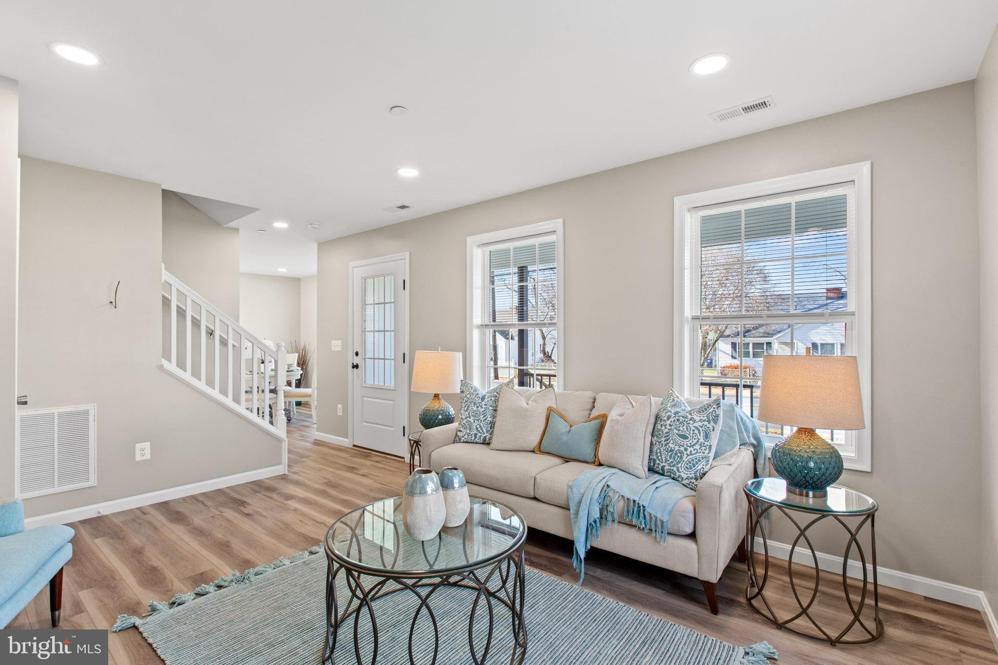 41573 Church Street Leonardtown, MD 20650 - Photo 7 of 27 a living room with furniture and a wooden floor