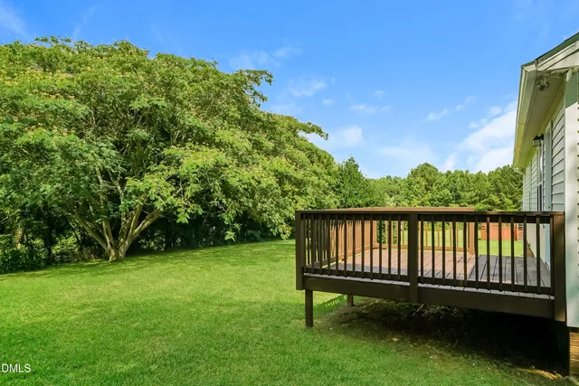 a view of a backyard with a garden