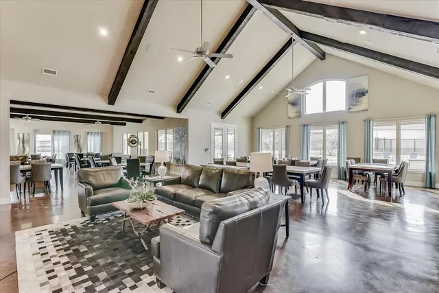 a view of an house with a big yard