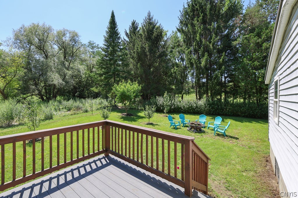 4279 Blue Creek Road Eaton, NY 13409 - Photo 29 of 43 The side deck's view toward the fire pit and many